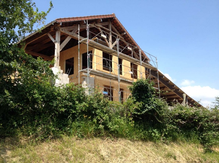 Maison individuelle dans un hangar : ossature bois